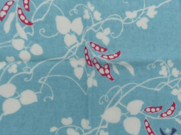 serviette conton doublé éponge motif fleurs fond bleu 35cmx35cm